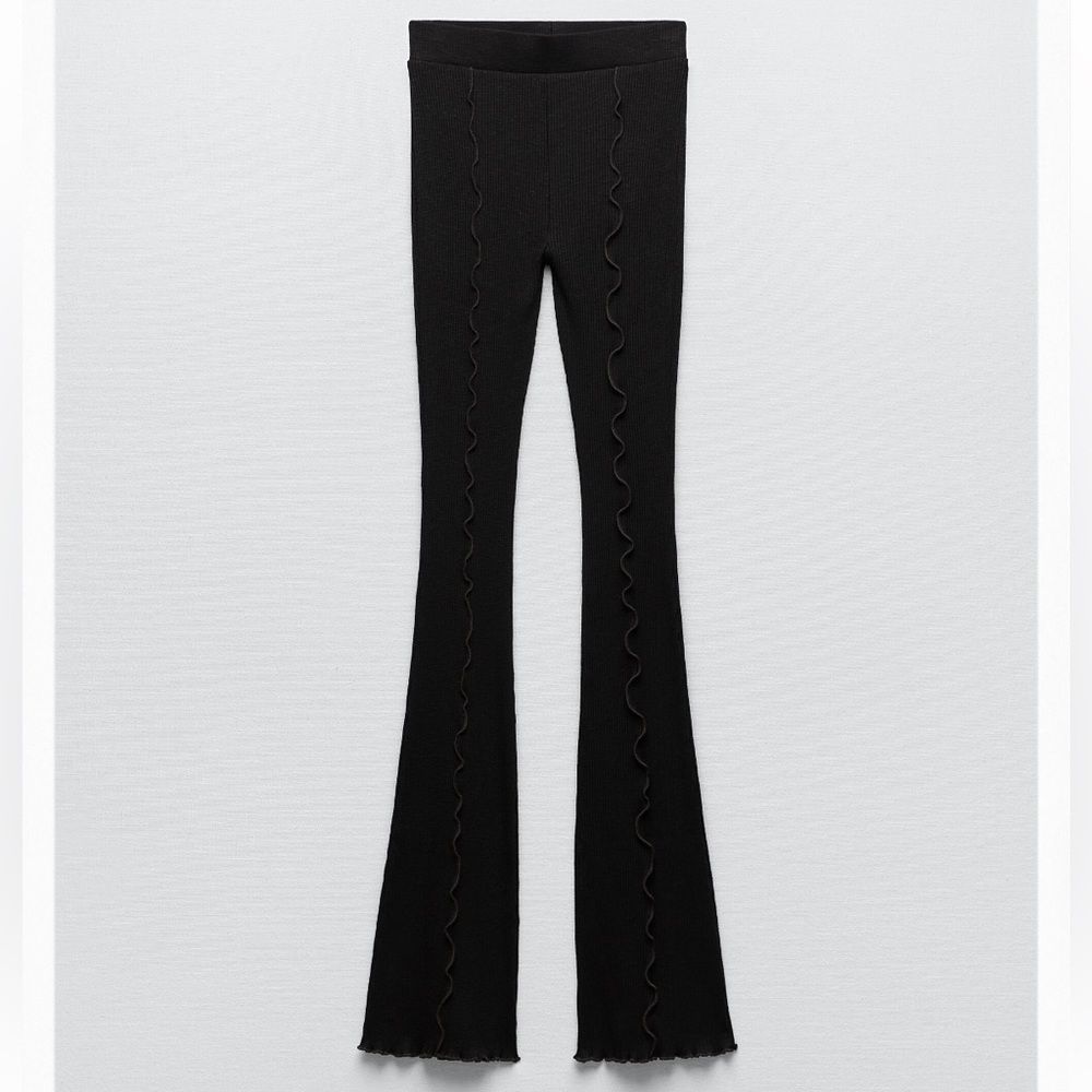 Black flared pants brown detailing